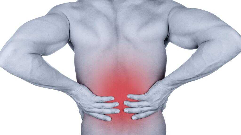 A patient suffering from lower back pain and requires relief chiropractic care.
